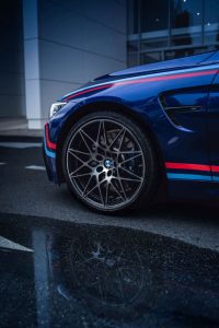 bmw with red and blue racing stripes